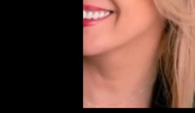 Woman suit between smiles